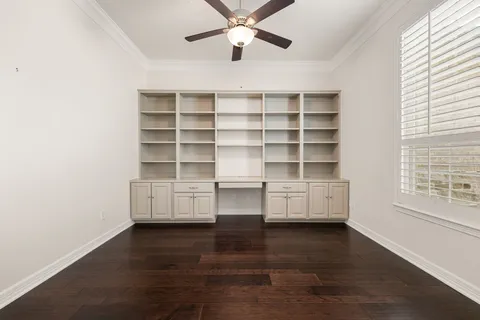 a view of a livingroom with furniture and window