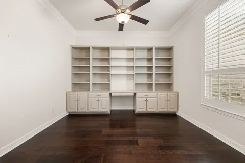 a view of a livingroom with furniture and window