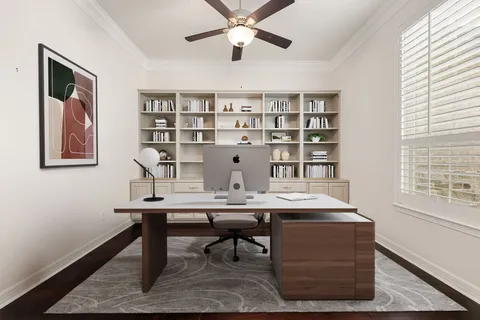 a view of a workspace with furniture