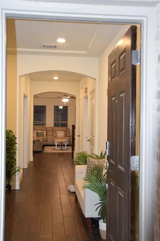 a living room with furniture and a table