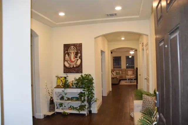 a dining room with a table and chairs