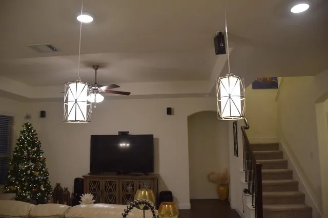 a view of a livingroom with furniture window and wooden floor