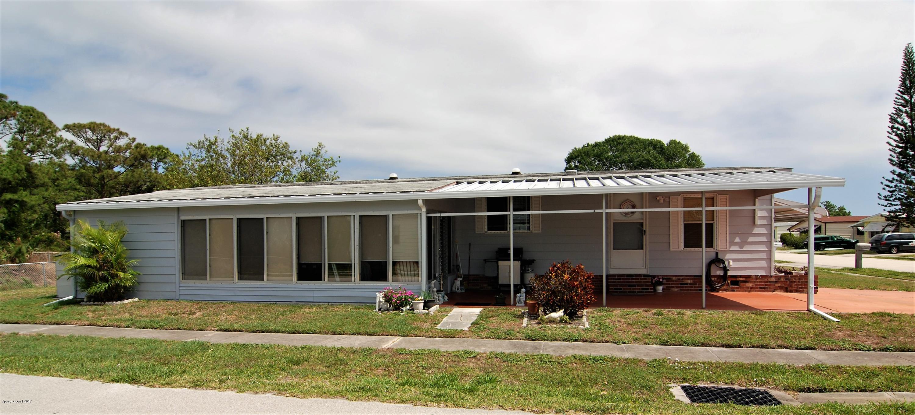 1788 Mango Street Northeast Palm Bay, FL 32905 - Photo 15 of 16 Side of Home