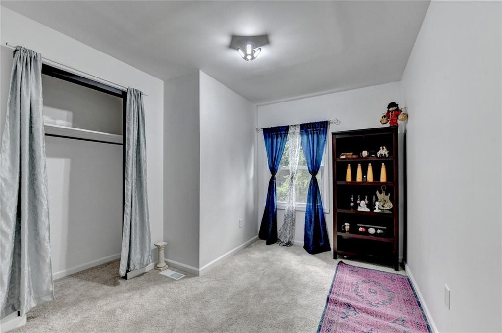 6654 Covington Road Lithonia, GA 30058 - Photo 21 of 39 a view of room with closet and entryway
