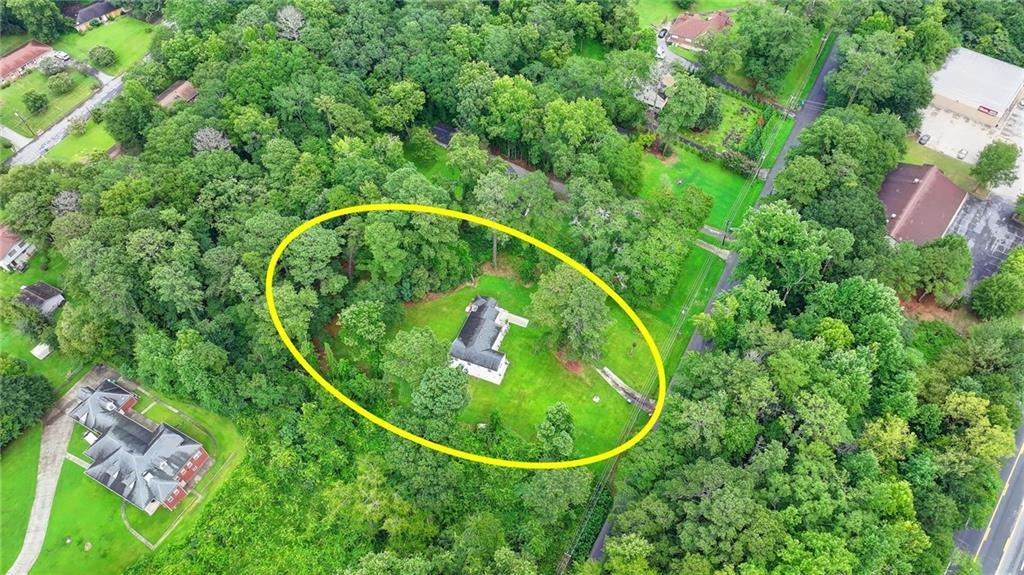 6654 Covington Road Lithonia, GA 30058 - Photo 39 of 39 an aerial view of a house