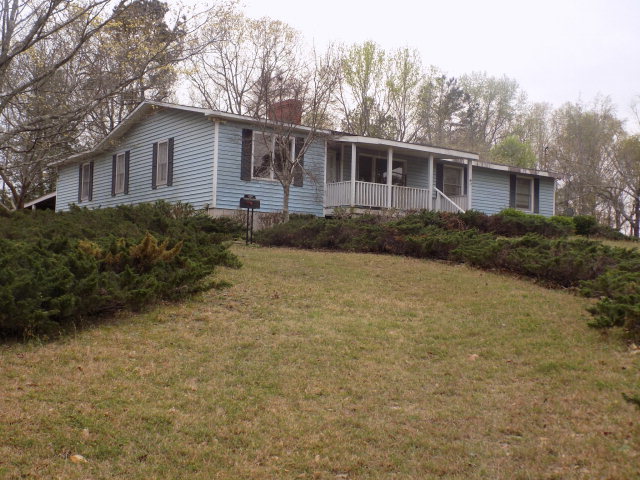 6288 Thomaston Road Macon, GA 31220 - Photo 1 of 9 a view of a house with a backyard