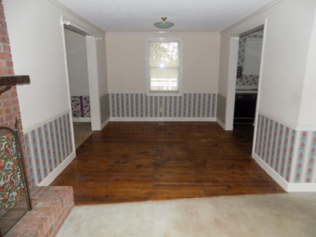 6288 Thomaston Road Macon, GA 31220 - Photo 3 of 9 a view of an empty room with a window