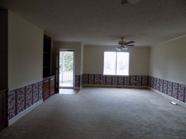 6288 Thomaston Road Macon, GA 31220 - Photo 7 of 9 an empty room with windows