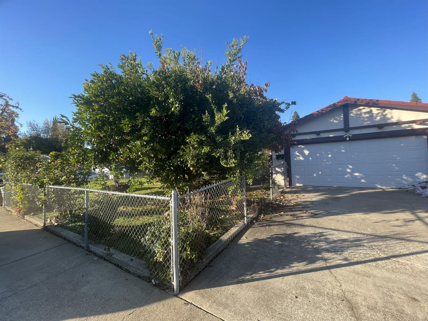 2852 Rascommon Way Sacramento, CA 95827 - Photo 2 of 6 a view of a street with a building in the background