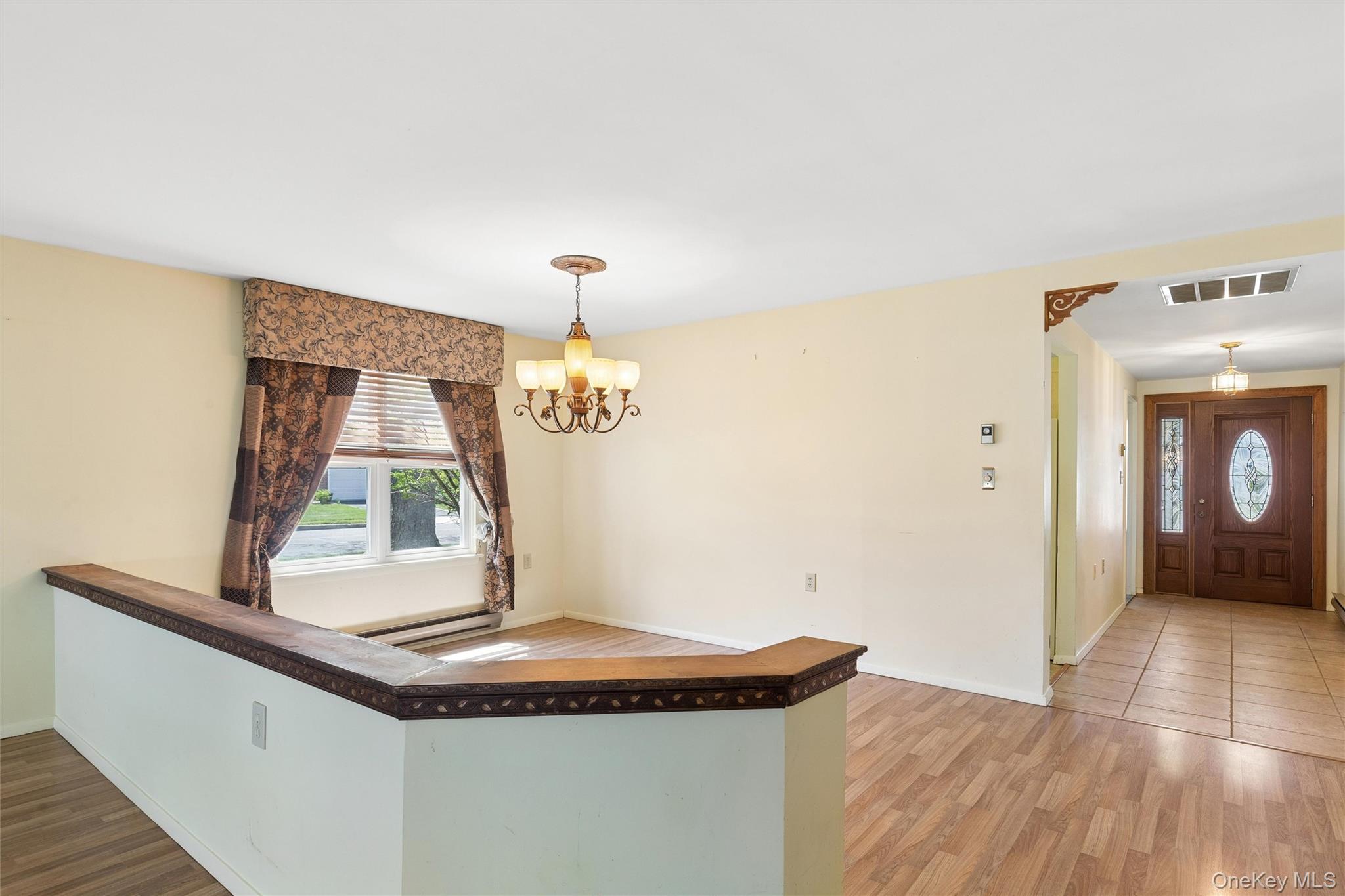 8 Coventry Court Ridge, NY 11961 - Photo 12 of 21 a room with a sink and a window