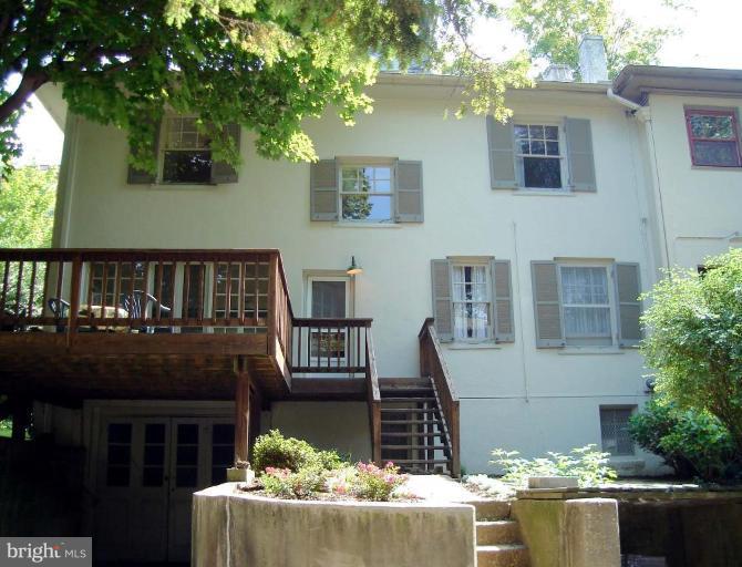 3926 Cloverhill Road Baltimore, MD 21218 - Photo 2 of 24 a front view of a house with a yard