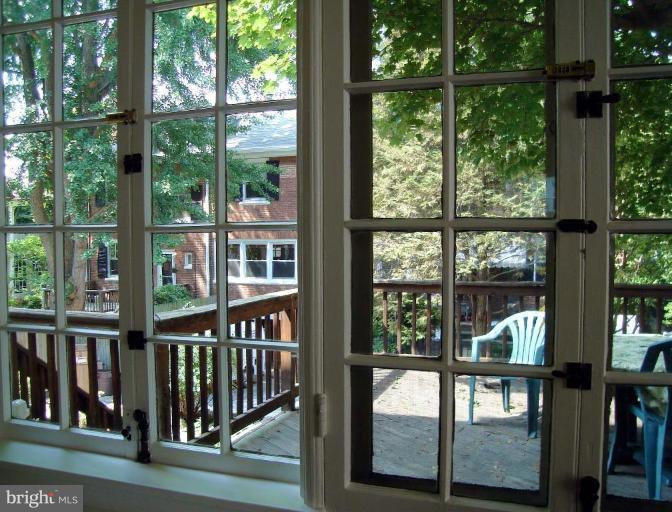 3926 Cloverhill Road Baltimore, MD 21218 - Photo 24 of 24 a view of a large window with an outdoor space