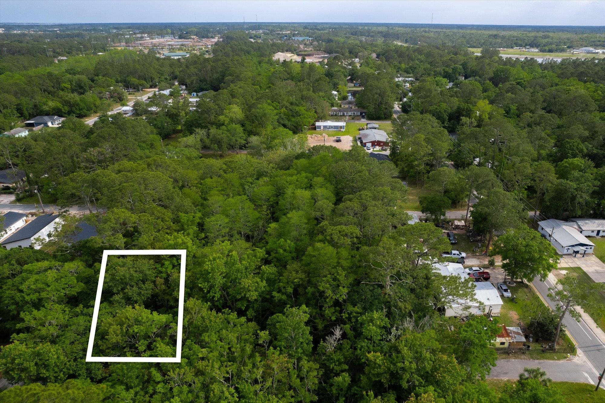 0 West 8th Street St. Augustine, FL 32084 - Photo 5 of 31 an aerial view of residential houses with outdoor space and trees