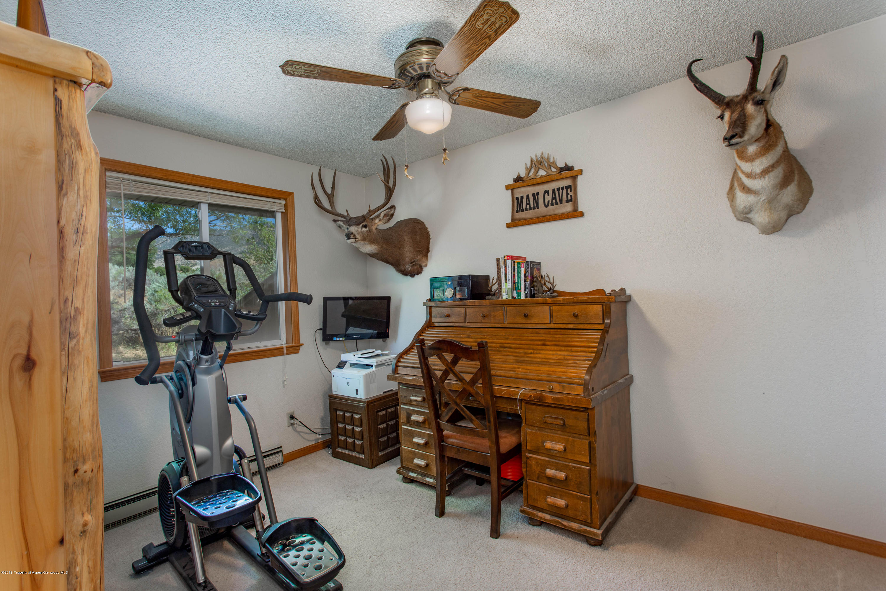 535 County Road 260 Rifle, CO 81650 - Photo 13 of 18 a view of a room with gym equipment