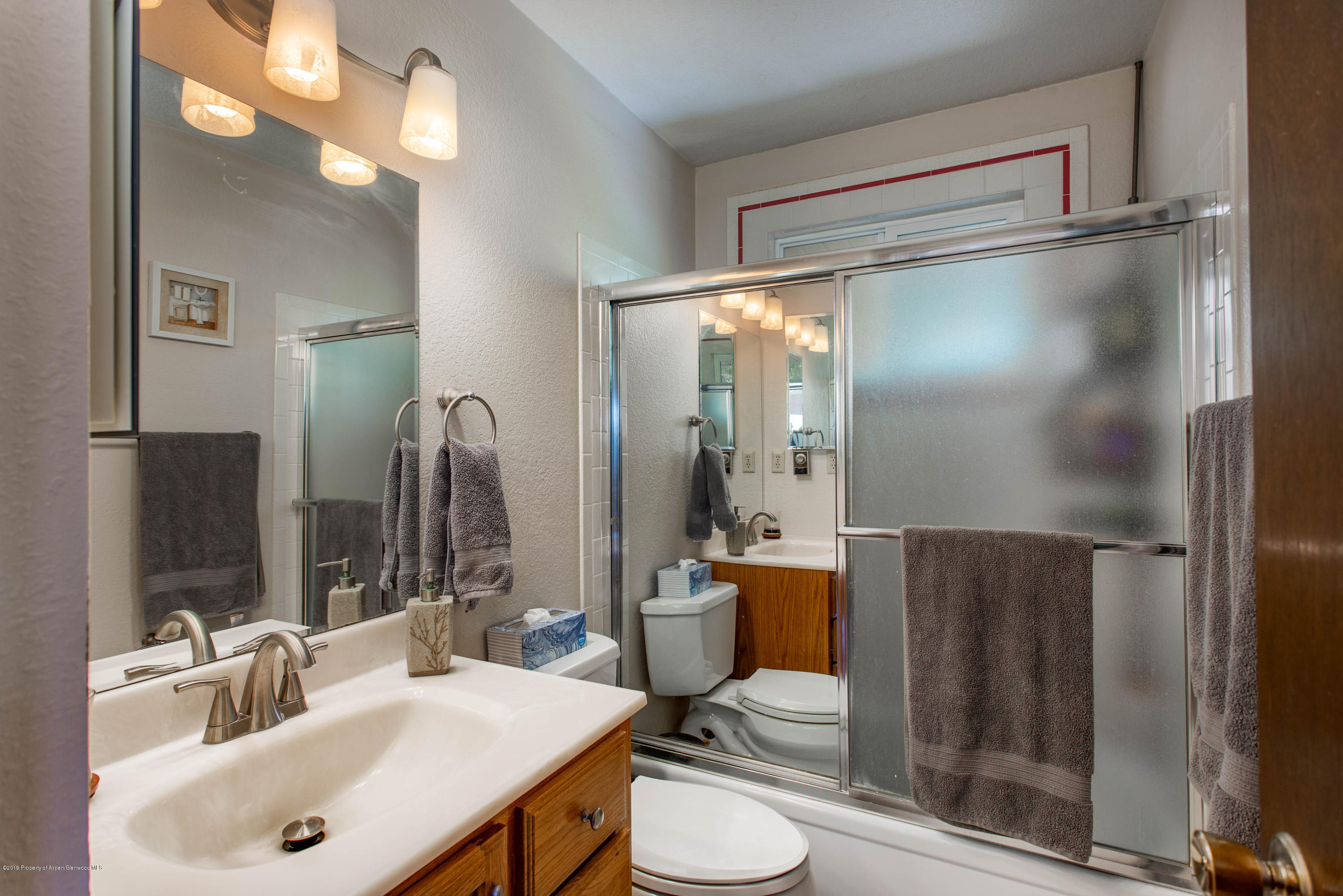 535 County Road 260 Rifle, CO 81650 - Photo 14 of 18 a bathroom with a sink toilet and shower