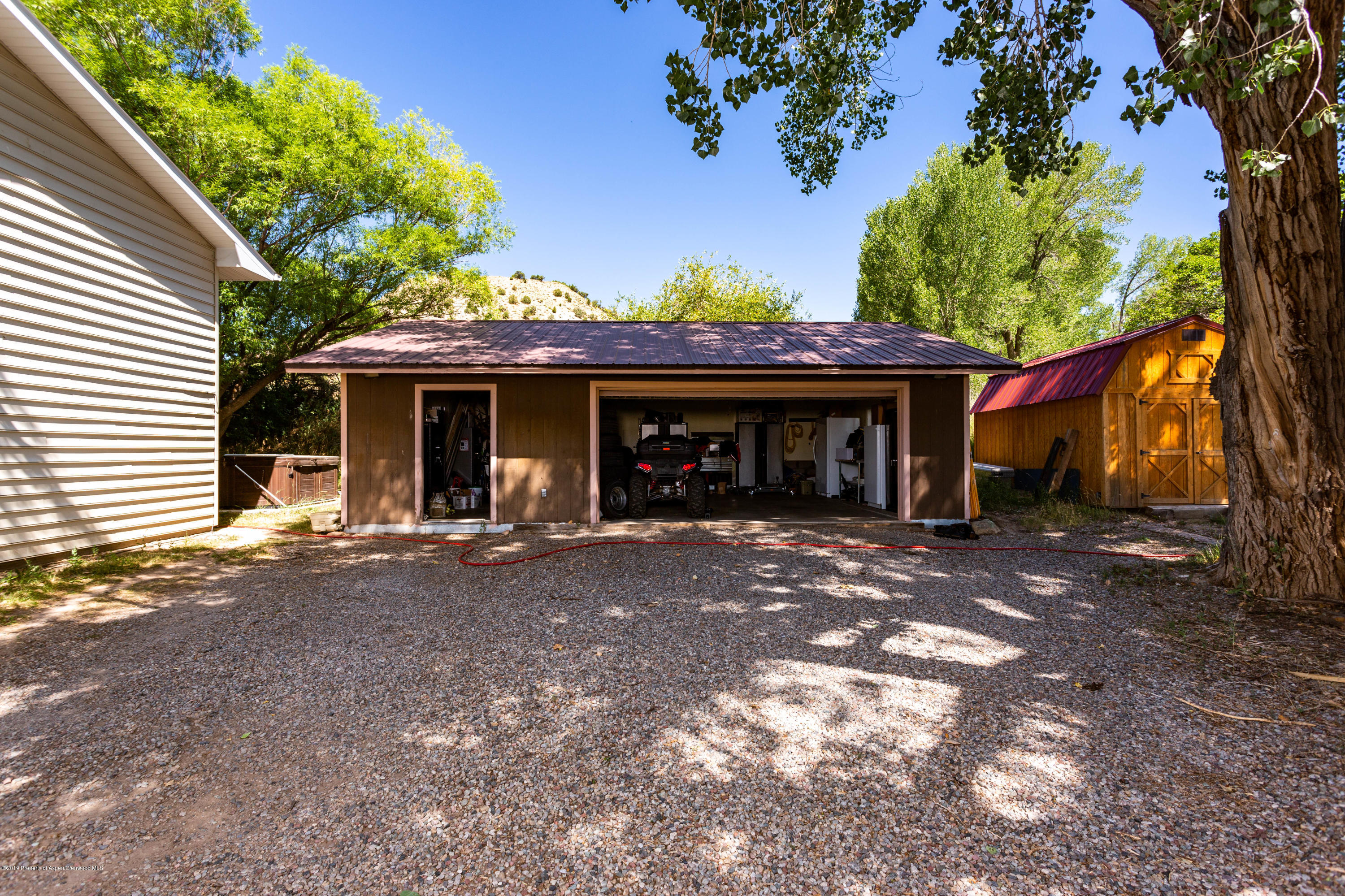 535 County Road 260 Rifle, CO 81650 - Photo 3 of 18 a view of a house with a yard and tree
