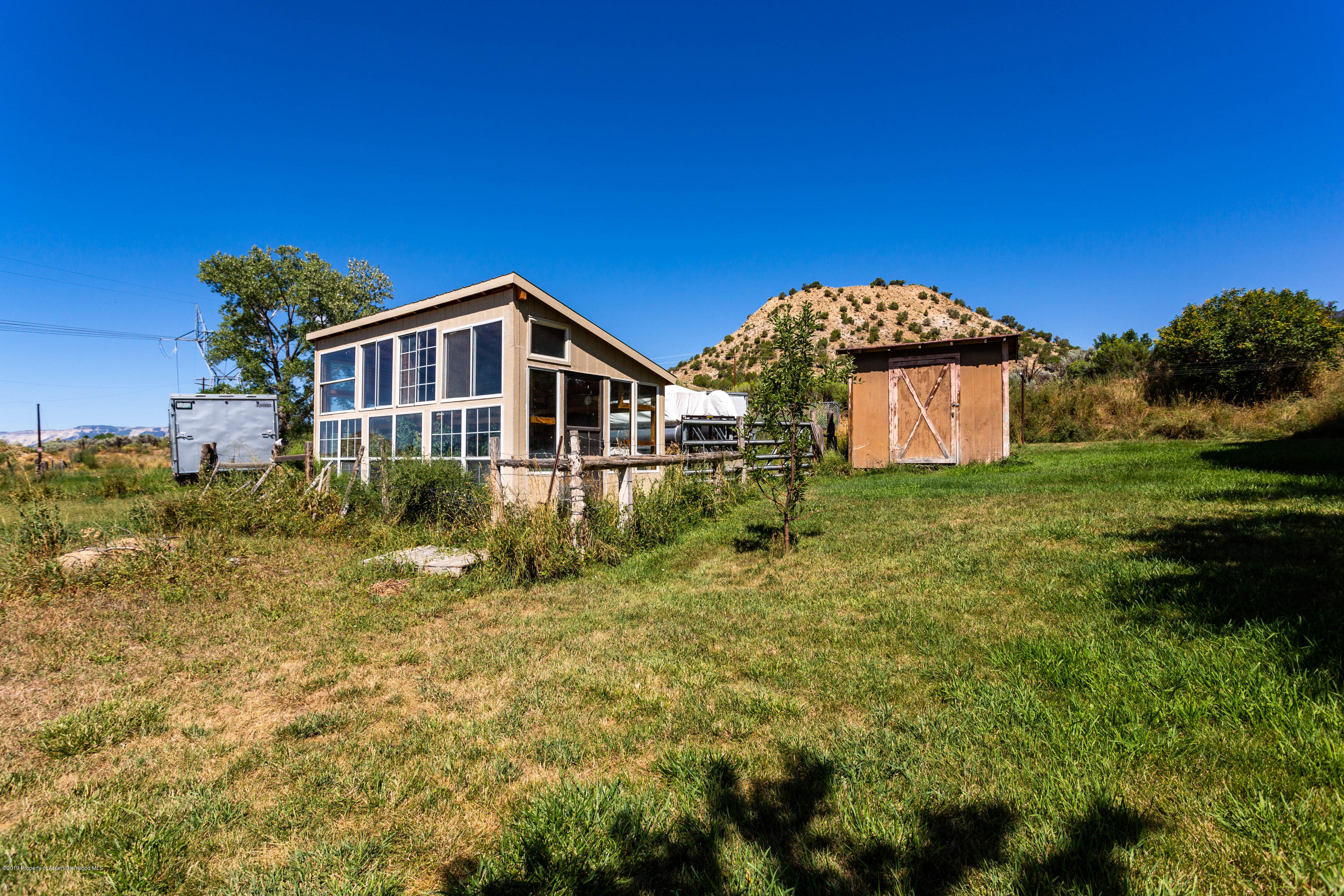 535 County Road 260 Rifle, CO 81650 - Photo 6 of 18 a front view of a house with a yard