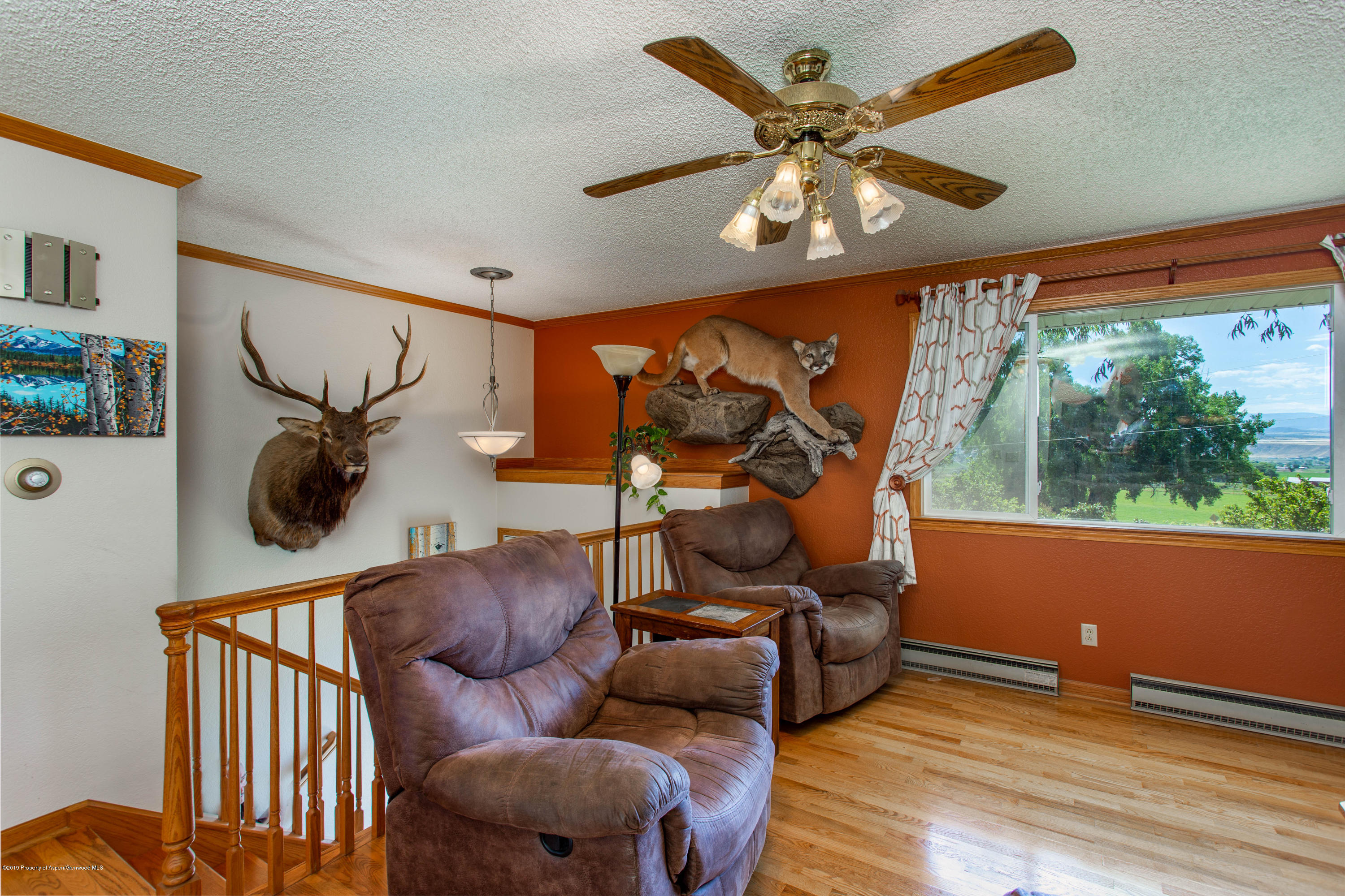 535 County Road 260 Rifle, CO 81650 - Photo 7 of 18 a room with furniture and stairs