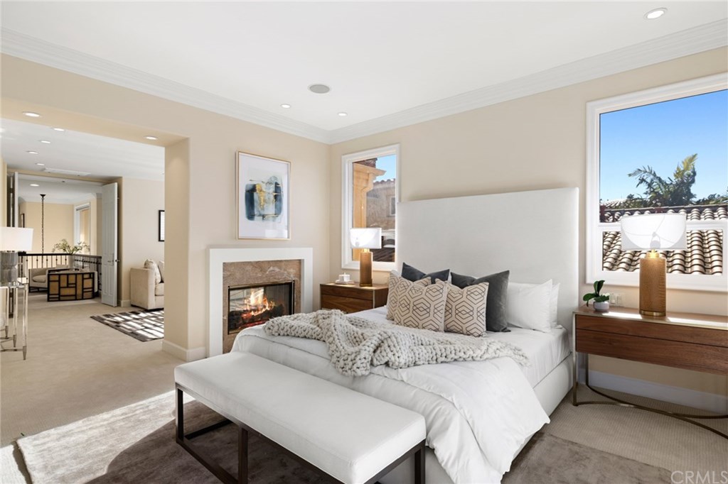 12 Sugar Pine Road Newport Coast, CA 92657 - Photo 21 of 45 Master Bedroom with two way fireplace.
