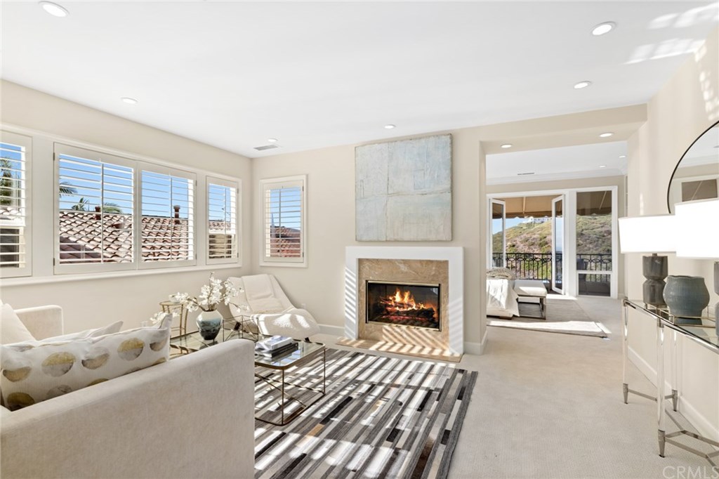 12 Sugar Pine Road Newport Coast, CA 92657 - Photo 22 of 45 Masterbathroom setting area with two-way fireplace
