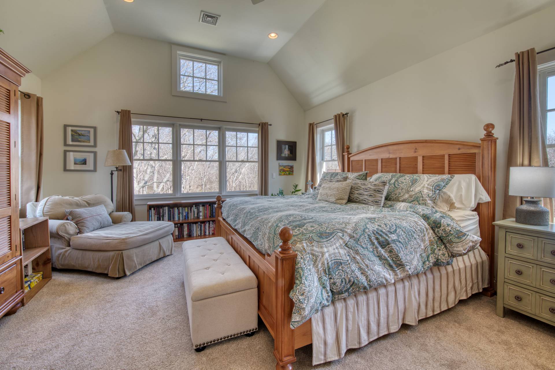 6 Wills Point Road Montauk, NY 11954 - Photo 5 of 16 a bedroom with a bed and a couch