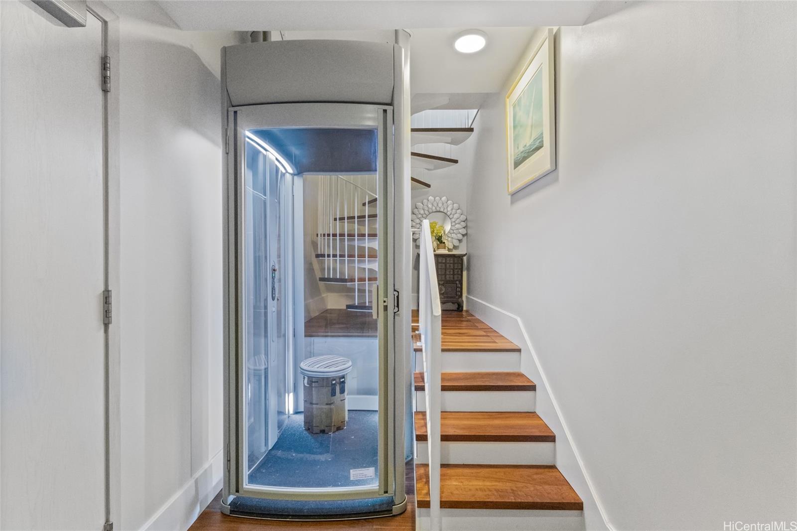 1108 Auahi Street, Unit 307 Honolulu, HI 96814 - Photo 14 of 23 a view of entryway and hall with wooden floor