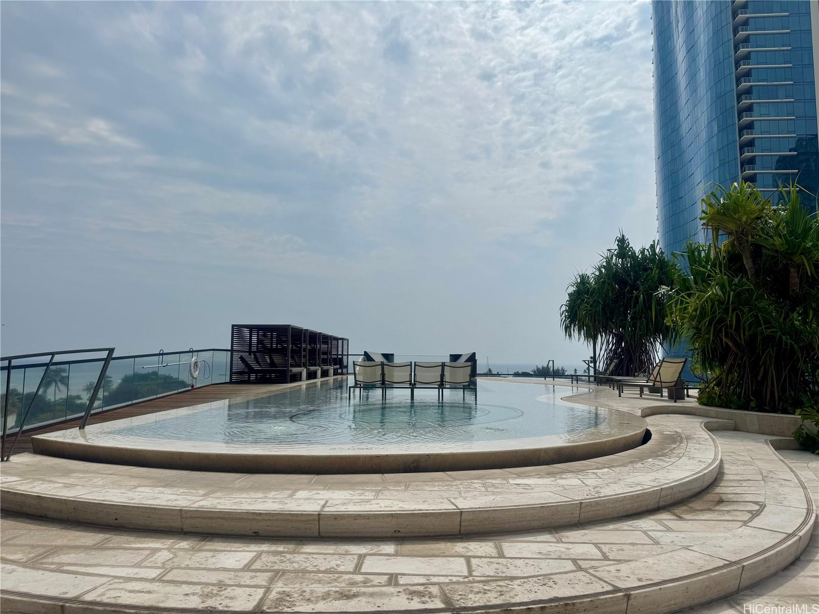 1108 Auahi Street, Unit 307 Honolulu, HI 96814 - Photo 16 of 23 a view of kitchen and dining room