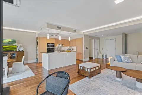 a living room with furniture and a table