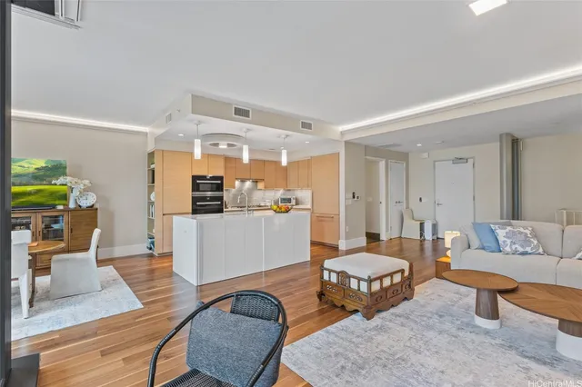 a living room with furniture and a table