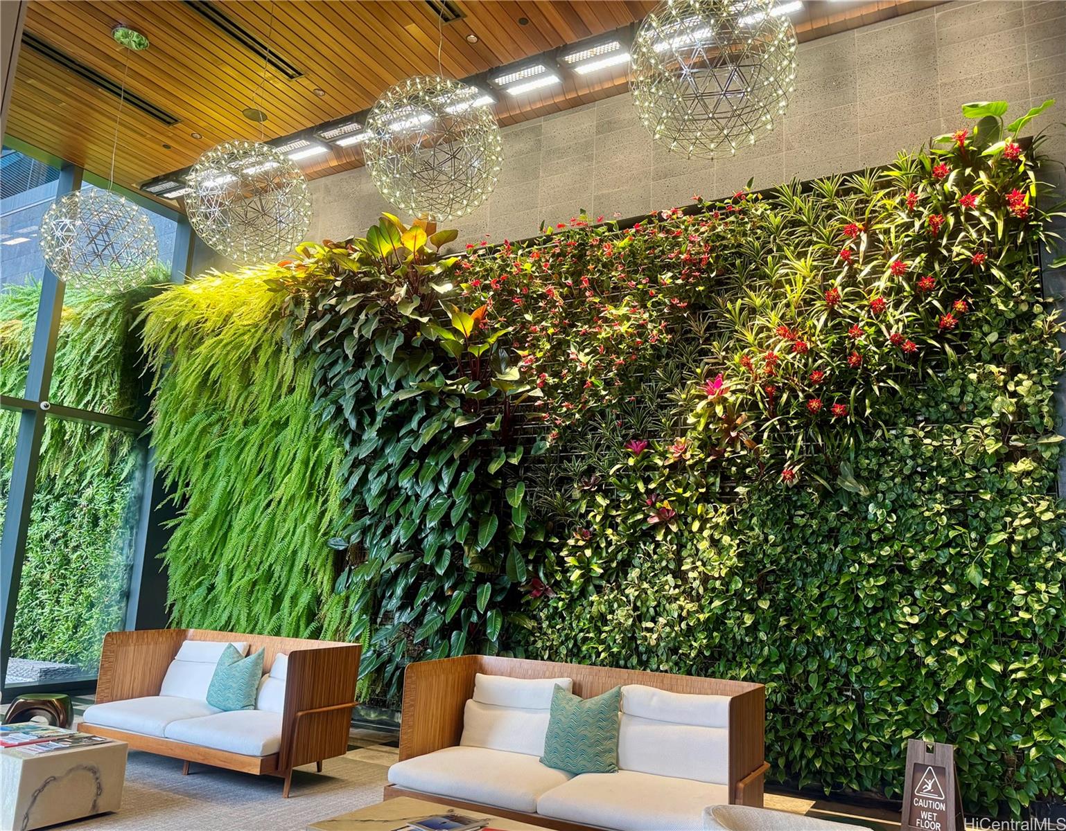 1108 Auahi Street, Unit 307 Honolulu, HI 96814 - Photo 22 of 23 a roof deck with table and chairs and potted plants