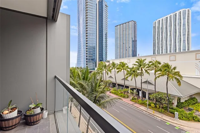 a view of balcony with potted plants