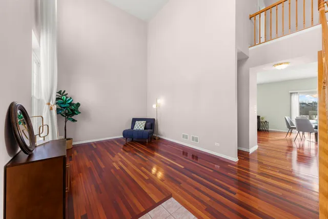 a workspace with furniture and wooden floor