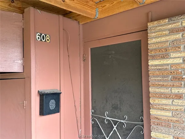 a view of a door and an outdoor space