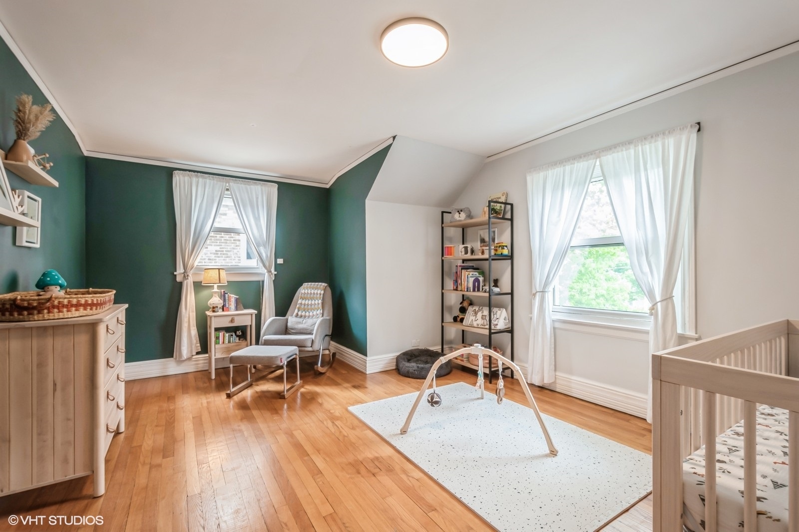 2107 Ewing Avenue Evanston, IL 60201 - Photo 21 of 36 a work room with furniture and a wooden floor