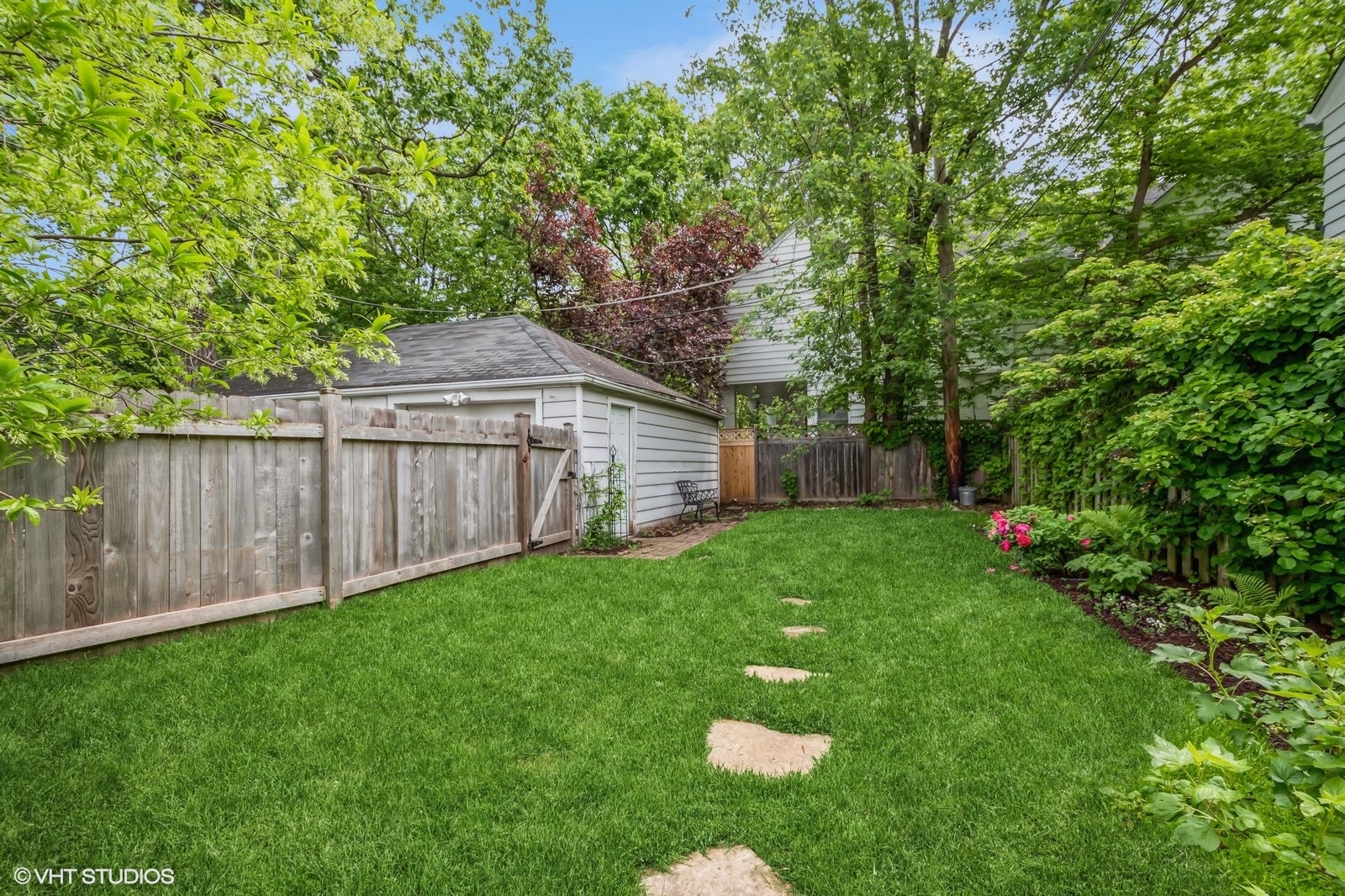 2107 Ewing Avenue Evanston, IL 60201 - Photo 31 of 36 a view of a backyard with a small cabin