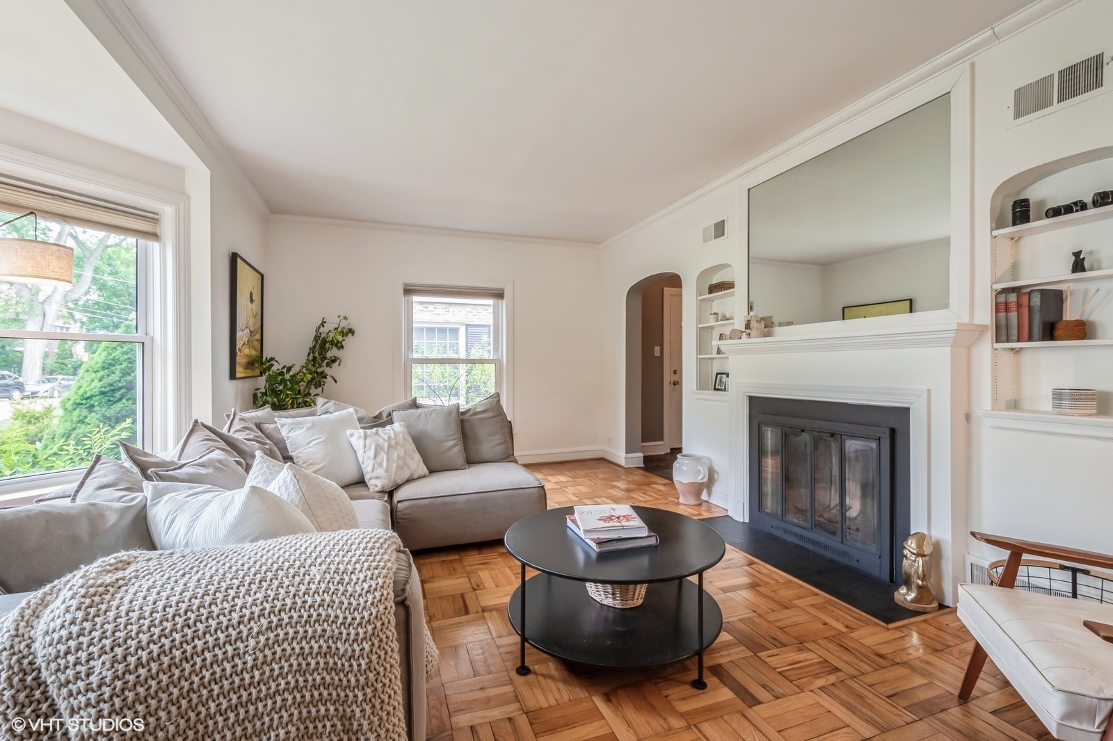 2107 Ewing Avenue Evanston, IL 60201 - Photo 5 of 36 a living room with furniture and a fireplace
