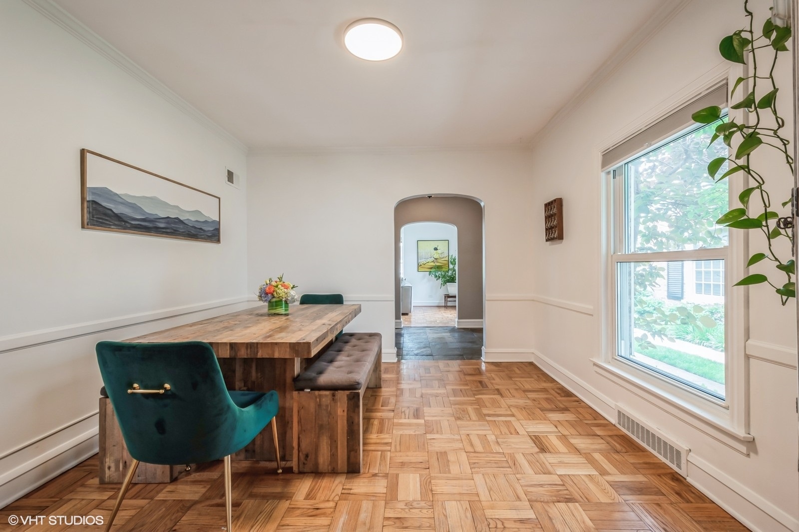 2107 Ewing Avenue Evanston, IL 60201 - Photo 10 of 36 a view of a dining room with furniture and a window