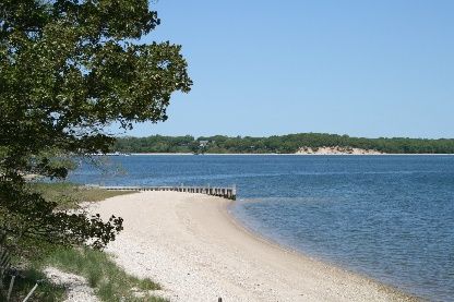Undisclosed Address Sag Harbor, NY 11963 - Photo 3 of 12 a view of a lake with houses in the back