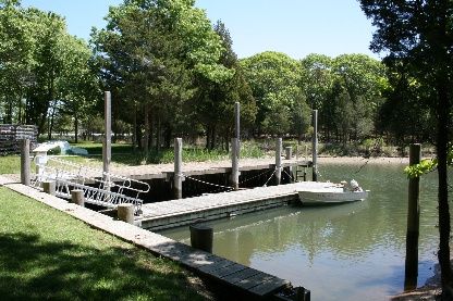 Undisclosed Address Sag Harbor, NY 11963 - Photo 6 of 12 a view of boat floating on water
