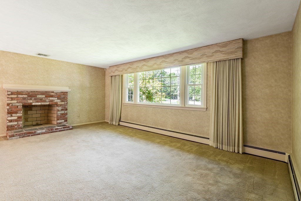 35 Williams Road Sharon, MA 02067 - Photo 7 of 25 an empty room with windows