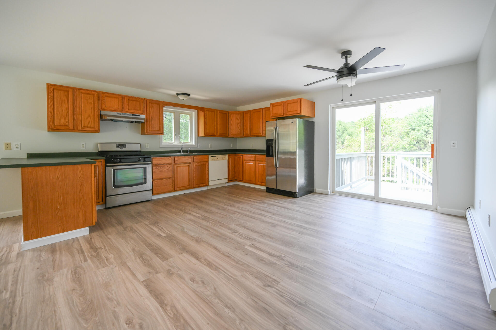 6 Garlands Way Limington, ME 04049 - Photo 12 of 46 Open kitchen, dining, living space