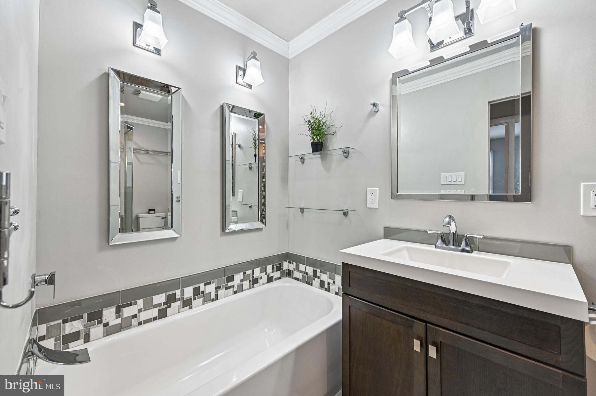 536 Maple Ridge Lane Odenton, MD 21113 - Photo 25 of 48 a bathroom with a sink and a mirror