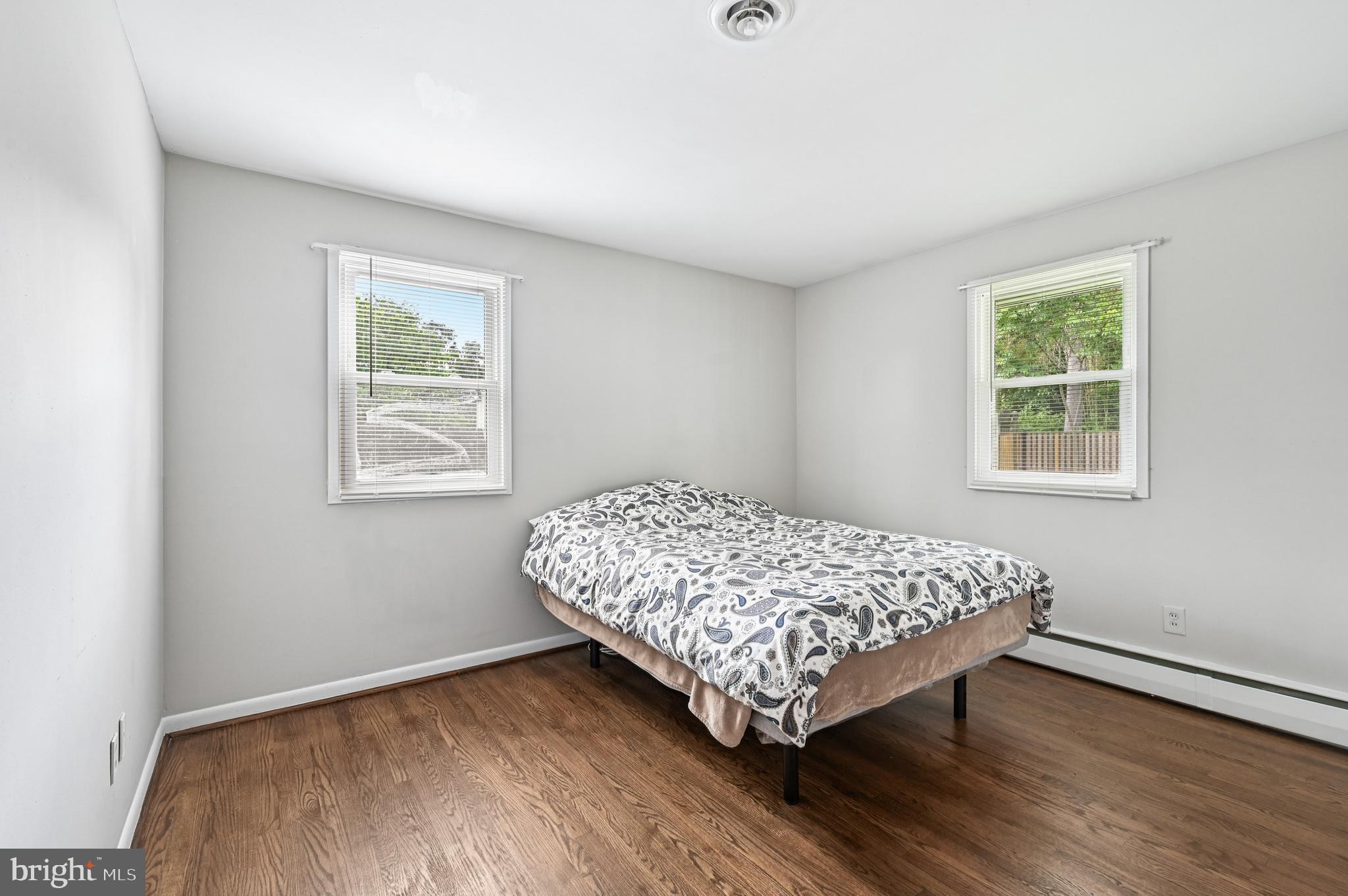 536 Maple Ridge Lane Odenton, MD 21113 - Photo 27 of 48 a bedroom with a bed and a window