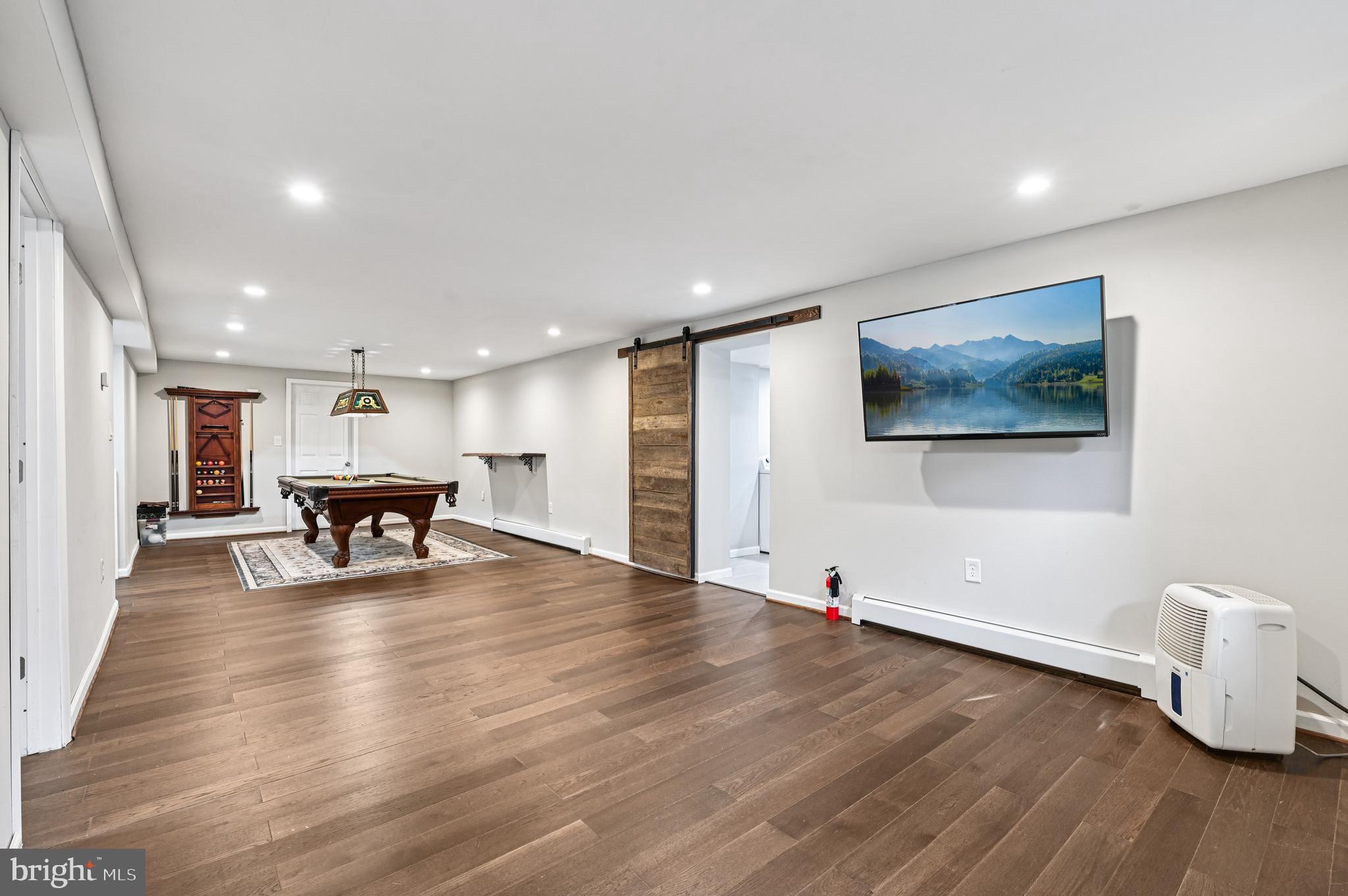536 Maple Ridge Lane Odenton, MD 21113 - Photo 34 of 48 a view of a livingroom with furniture and wooden floor