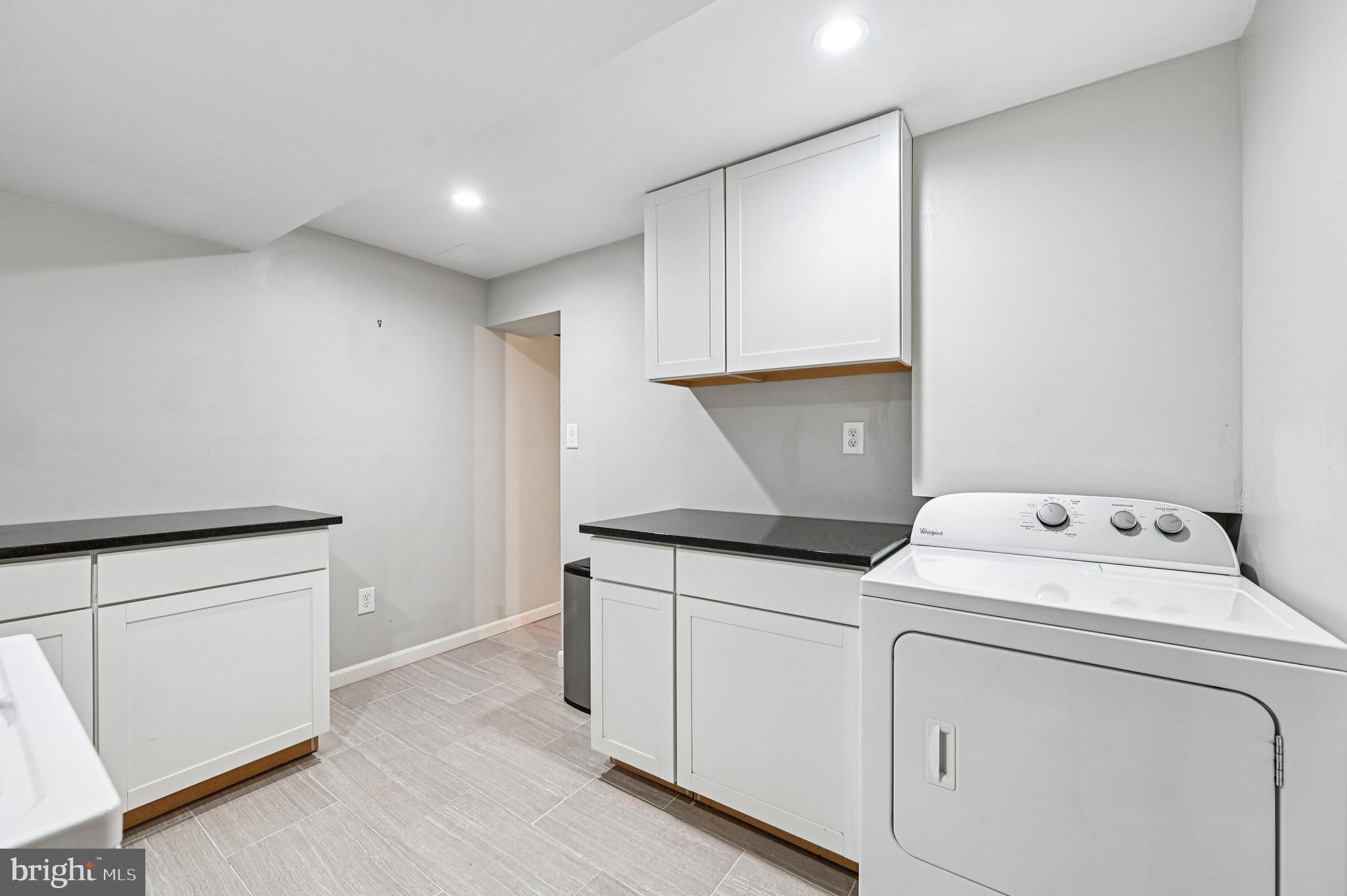 536 Maple Ridge Lane Odenton, MD 21113 - Photo 35 of 48 a view of storage and utility room with washer and dryer