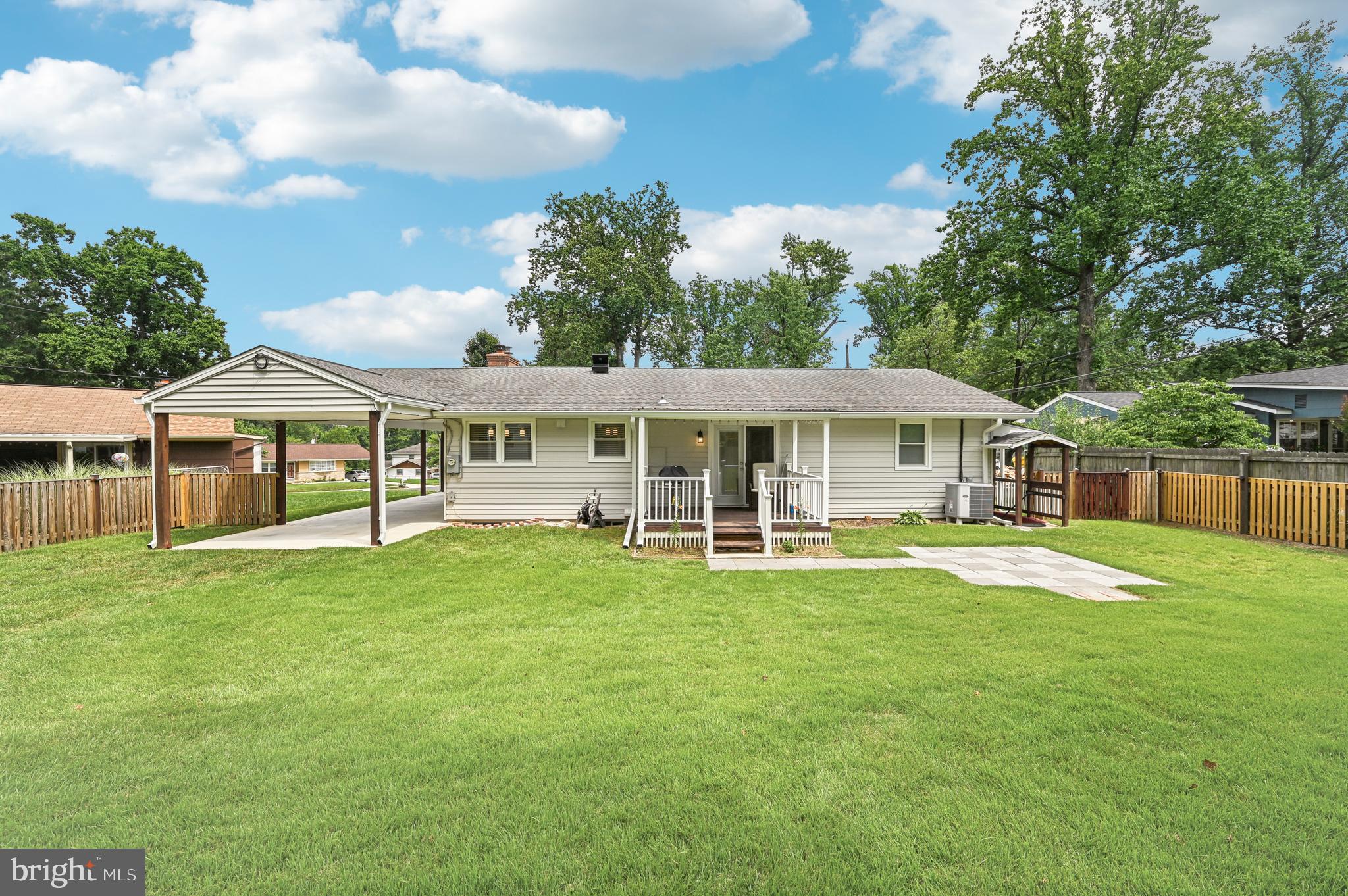 536 Maple Ridge Lane Odenton, MD 21113 - Photo 43 of 48 a front view of a house with a garden