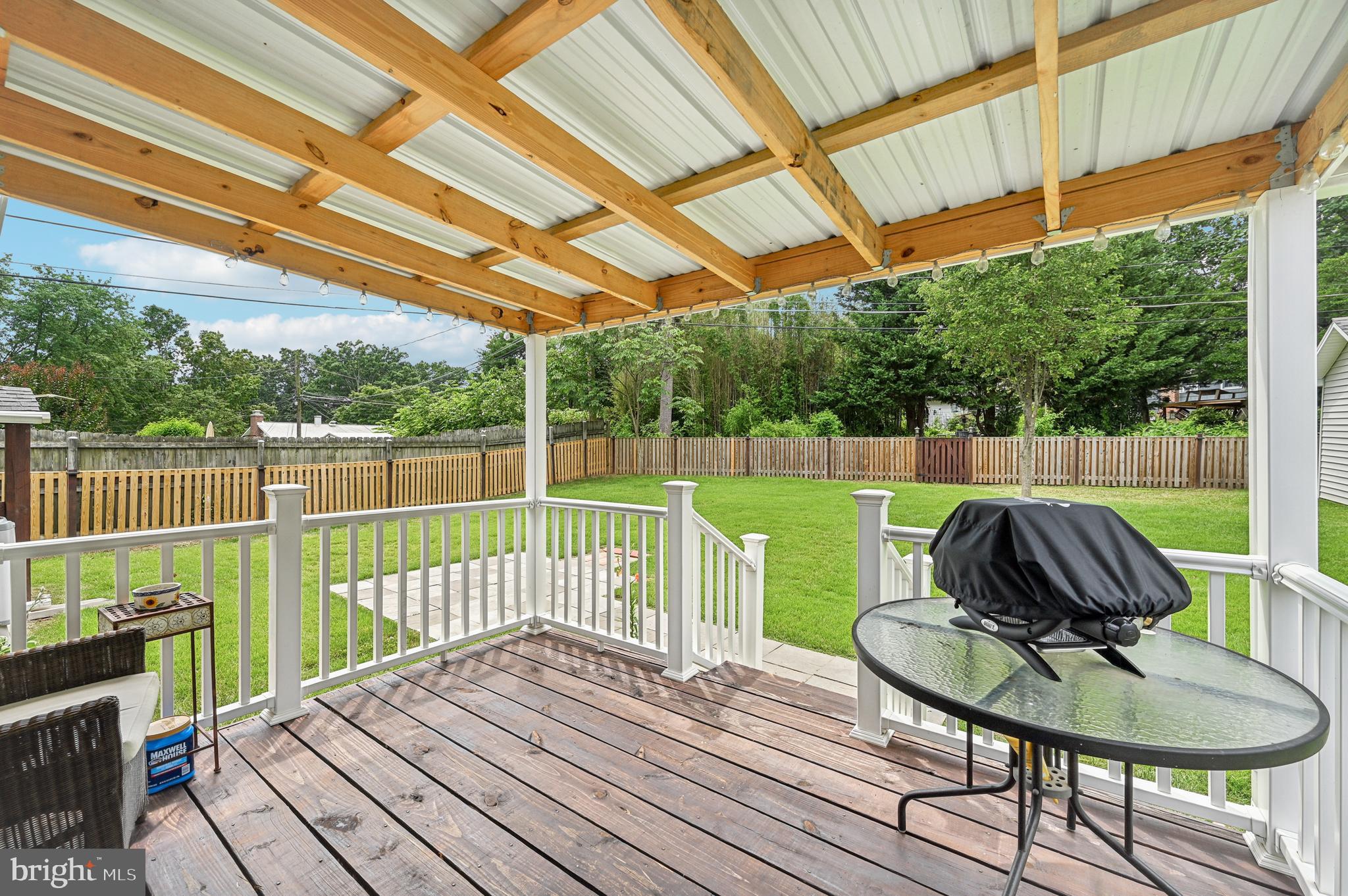 536 Maple Ridge Lane Odenton, MD 21113 - Photo 45 of 48 a view of a chair and table on the deck