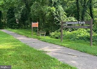 536 Maple Ridge Lane Odenton, MD 21113 - Photo 48 of 48 a front view of a house with a yard and potted plants