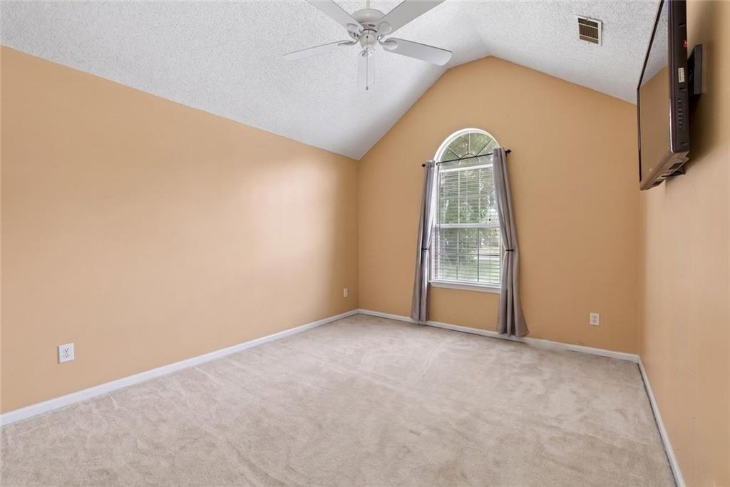 45 Windscape Drive Covington, GA 30016 - Photo 29 of 39 an empty room with windows and closet