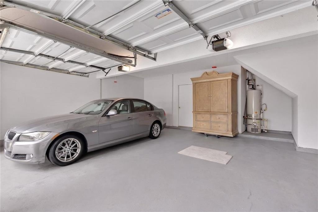 45 Windscape Drive Covington, GA 30016 - Photo 32 of 39 a view of a car in garage